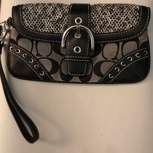 Coach black and Gray wristlet with buckle and bow detail